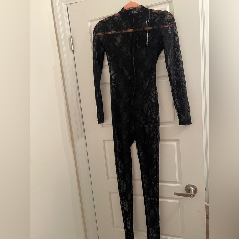 Sexy black lace fashion nova jumpsuit with tags !!